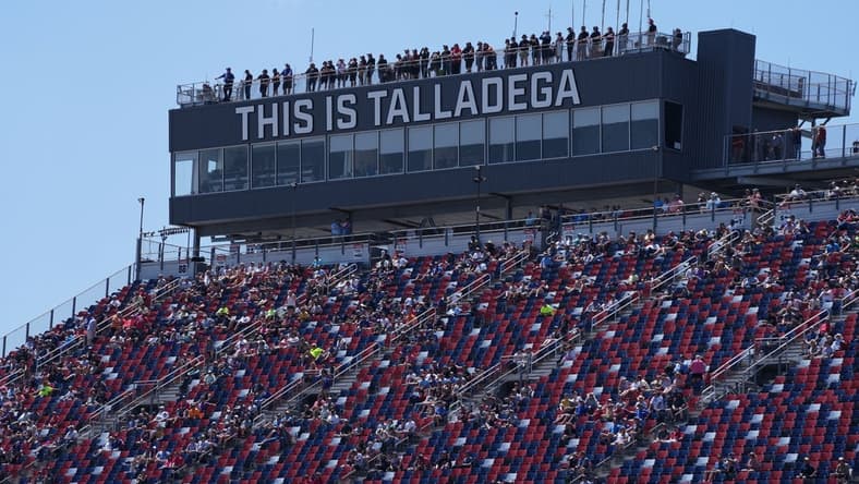 Apr 23, 2022; Talladega, Alabama, USA; Driver spotters stand atop of the grand stand press box during the General Tire 200 at Talladega Superspeedway. Mandatory Credit: Jasen Vinlove-USA TODAY Sports