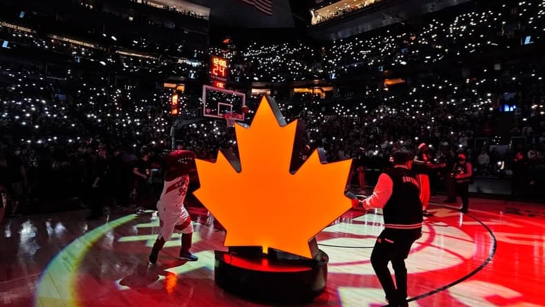 Apr 20, 2022; Toronto, Ontario, CAN; A view of the Toronto Raptors fans Light Up the North routine during player introductions of game three of the first round for the 2022 NBA playoffs against the Philadelphia 76ers at Scotiabank Arena. Mandatory Credit: John E. Sokolowski-USA TODAY Sports