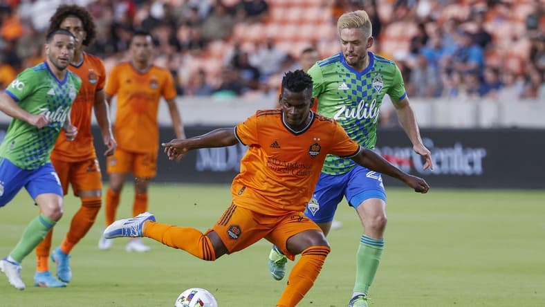 May 18, 2022; Houston, Texas, USA; Houston Dynamo FC forward Darwin Quintero (23) kicks the ball during the first half against the Seattle Sounders FC at PNC Stadium. Mandatory Credit: Troy Taormina-USA TODAY Sports