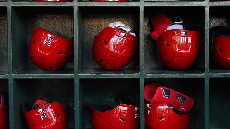 Jun 6, 2022; Anaheim, California, USA; Batting helmets of Los Angeles Angels players in the dugout during a game against the Boston Red Sox at Angel Stadium. Mandatory Credit: Kirby Lee-USA TODAY Sports