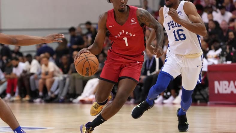 Jul 9, 2022; Las Vegas, NV, USA; Toronto Raptors guard Armoni Brooks (1) dribbles away from Philadelphia 76ers guard Charlie Brown Jr. (16) during an NBA Summer League game at Cox Pavilion. Mandatory Credit: Stephen R. Sylvanie-USA TODAY Sports
