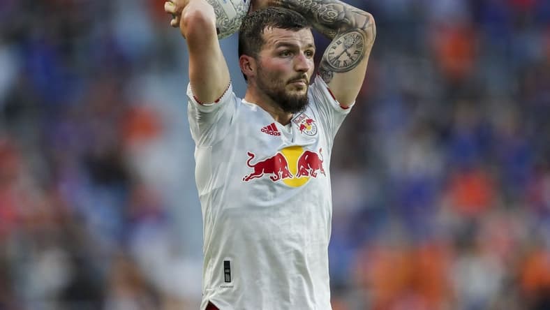 Jul 9, 2022; Cincinnati, Ohio, USA; New York Red Bulls defender Tom Edwards (7) throws in the ball against FC Cincinnati in the second half at TQL Stadium. Mandatory Credit: Katie Stratman-USA TODAY Sports