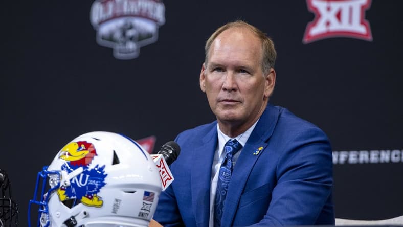 Jul 13, 2022; Arlington, TX, USA; Kansas Jayhawks head coach Lance Leipold is interviewed during the Big 12 Media Day at AT&T Stadium. Mandatory Credit: Jerome Miron-USA TODAY Sports