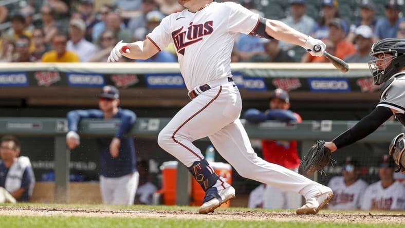 Jul 17, 2022; Minneapolis, Minnesota, USA; Minnesota Twins catcher Caleb Hamilton (90) makes his major league debut grounding out to short against the Chicago White Sox in his first at-bat in the eighth inning at Target Field. Mandatory Credit: Bruce Kluckhohn-USA TODAY Sports