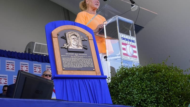 Jul 24, 2022; Cooperstown, New York, USA; Irene Hodges, daughter of Gil Hodges, speaks on behalf of Hall of Fame Posthumous inductee Gil Hodges during the Baseball Hall of Fame Induction Ceremony at Clark Sports Center. Mandatory Credit: Gregory Fisher-USA TODAY Sports