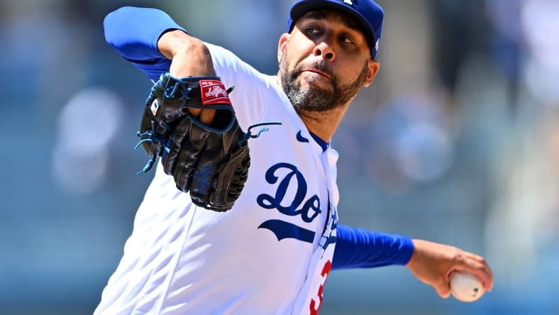 Jul 27, 2022; Los Angeles, California, USA; Los Angeles Dodgers relief pitcher David Price (33) throws a scoreless ninth against the Washington Nationals at Dodger Stadium. Mandatory Credit: Jayne Kamin-Oncea-USA TODAY Sports