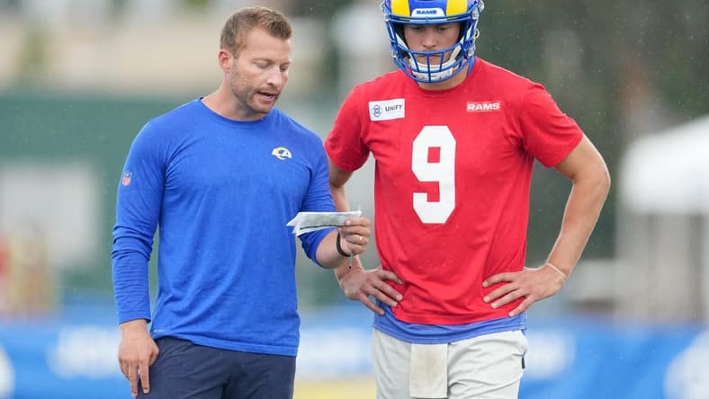 Jul 31, 2022; Irvine, CA, USA; Los Angeles Rams coach Sean McVay (left) and quarterback Matthew Stafford (9) during training camp at UC Irvine. Mandatory Credit: Kirby Lee-USA TODAY Sports