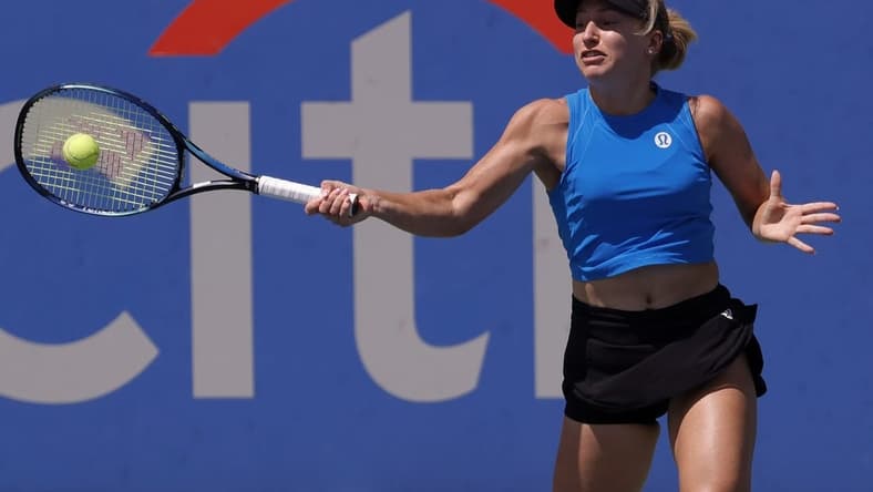 Aug 6, 2022; Washington, DC, USA; Daria Saville (AUS) hits a forehand against Kaia Kanepi (EST) (not pictured) in a women's singles semifinal on day six of the Citi Open at Rock Creek Park Tennis Center. Mandatory Credit: Geoff Burke-USA TODAY Sports