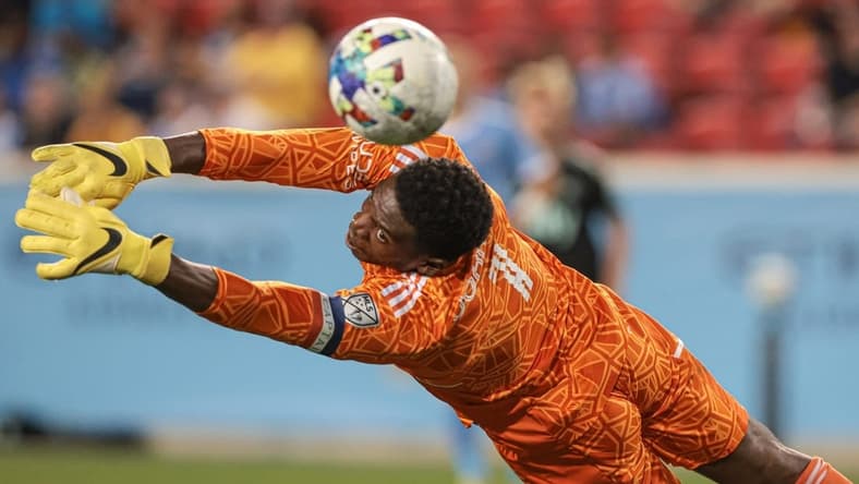 Aug 17, 2022; Harrison, New Jersey, USA; New York City FC goalkeeper Sean Johnson (1) cannot stop a shot by Charlotte FC midfielder Brandt Bronico (not pictured) for a goal during the second half at Red Bull Arena. Mandatory Credit: Vincent Carchietta-USA TODAY Sports