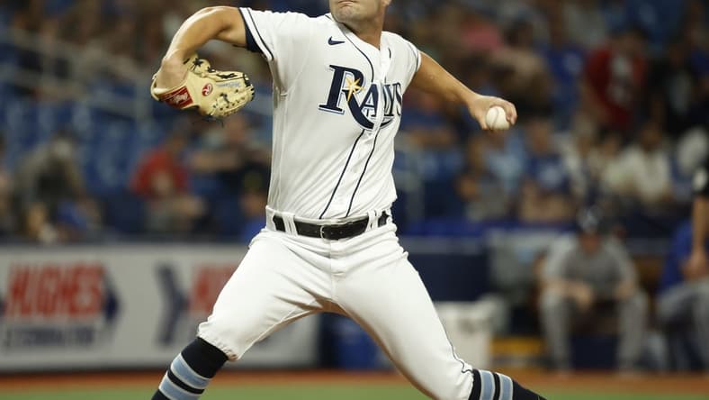Aug 19, 2022; St. Petersburg, Florida, USA;  Tampa Bay Rays starting pitcher Shane McClanahan (18) throws a pitch against the Kansas City Royals during the second inning at Tropicana Field. Mandatory Credit: Kim Klement-USA TODAY Sports