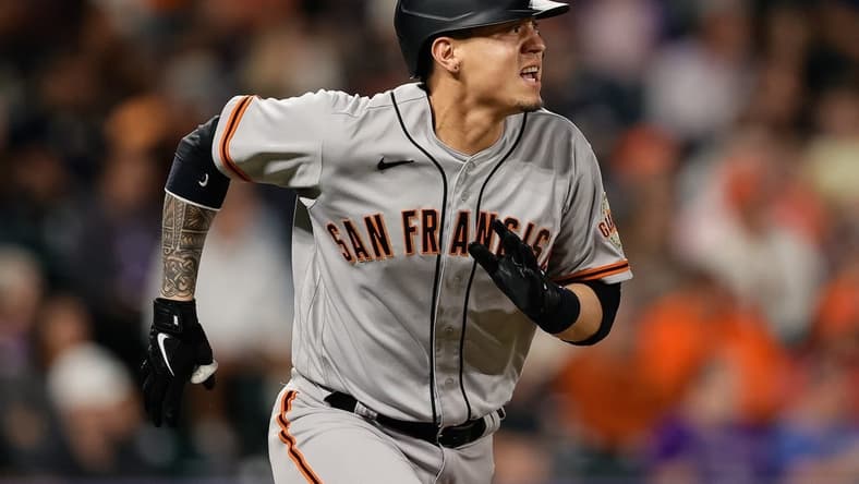 Aug 19, 2022; Denver, Colorado, USA; San Francisco Giants second baseman Wilmer Flores (41) watches his ball on a double in the eighth inning against the Colorado Rockies at Coors Field. Mandatory Credit: Isaiah J. Downing-USA TODAY Sports