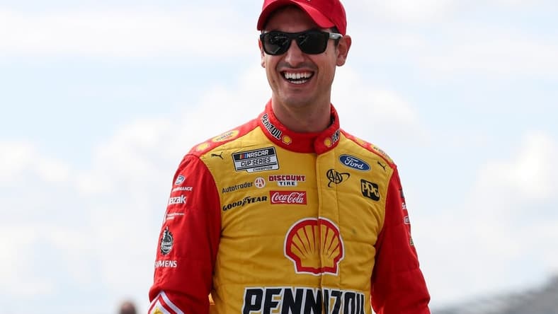Aug 20, 2022; Watkins Glen, New York, USA; NASCAR Cup Series driver Joey Logano walks on pit road during practice and qualifying for the Go Bowling at The Glen at Watkins Glen International. Mandatory Credit: Matthew OHaren-USA TODAY Sports