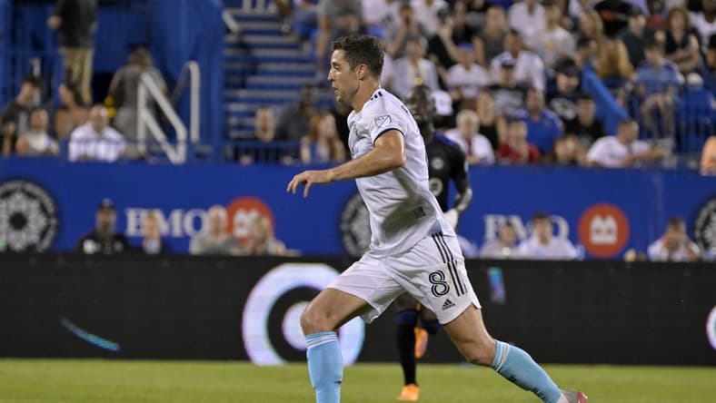 Aug 20, 2022; Montreal, Quebec, CAN; New England Revolution midfielder Matt Polster (8) controls the ball against CF Montreal during the second half at Stade Saputo. Mandatory Credit: Eric Bolte-USA TODAY Sports