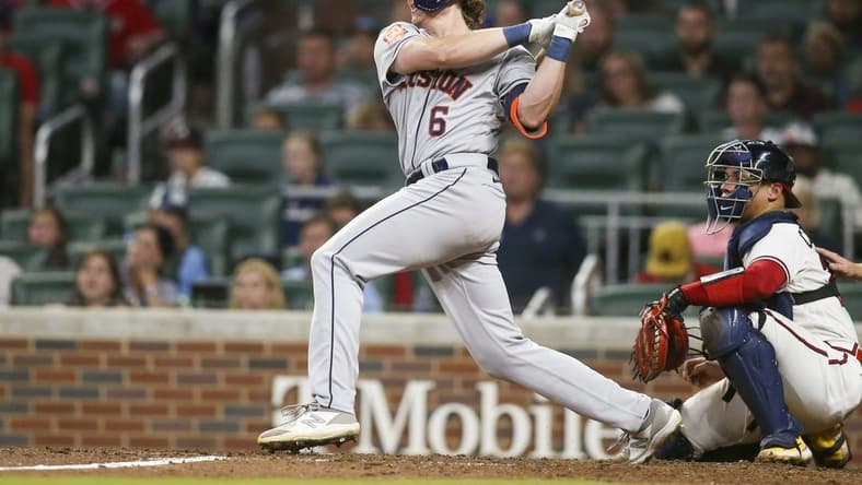 Aug 20, 2022; Atlanta, Georgia, USA; Houston Astros center fielder Jake Meyers (6) hits a RBI single against the Atlanta Braves in the tenth inning at Truist Park. Mandatory Credit: Brett Davis-USA TODAY Sports