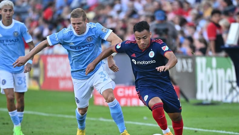 Aug 21, 2022; Chicago, Illinois, USA;  Chicago Fire FC forward Jairo Torres (7) controls the ball ahead of New York City FC defender Anton Tinnerholm (3) in the second half at Bridgeview Stadium. New York City FC defeated Chicago 2-0. Mandatory Credit: Jamie Sabau-USA TODAY Sports