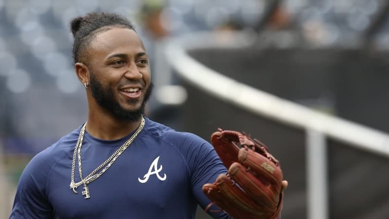 Aug 22, 2022; Pittsburgh, Pennsylvania, USA;  Atlanta Braves infielder Ozzie Albies (1) warms up before the game against the Pittsburgh Pirates at PNC Park. Mandatory Credit: Charles LeClaire-USA TODAY Sports