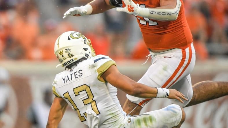 Clemson defensive lineman Bryan Bresee (11) pressures Georgia Tech freshman Jordan Yates (13) during the third quarter in Clemson, S.C., September 18, 2021.

Ncaa Football Georgia Tech At Clemson