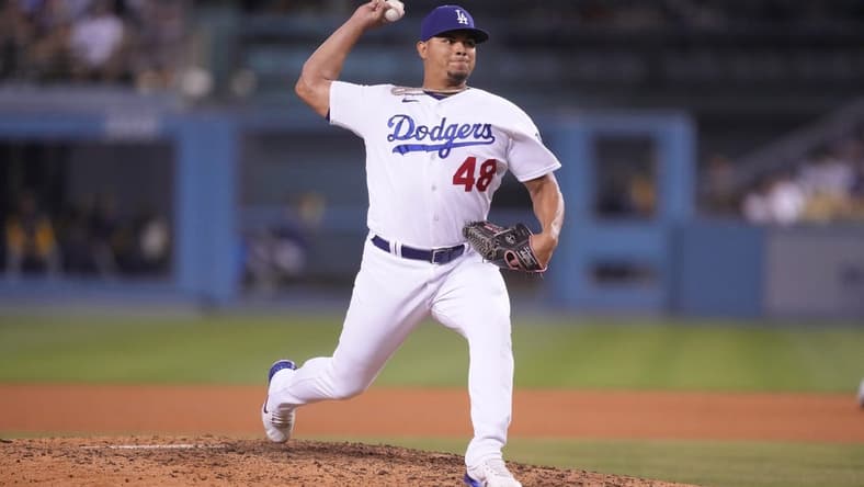 Aug 24, 2022; Los Angeles, California, USA; Los Angeles Dodgers relief pitcher Brusdar Graterol (48) throws in the seventh inning against the Milwaukee Brewers at Dodger Stadium. Mandatory Credit: Kirby Lee-USA TODAY Sports