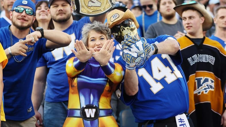 Aug 25, 2022; Winnipeg, Manitoba, CAN; Winnipeg Blue Bombers fans react during the first half against the Calgary Stampeders at IG Field. Mandatory Credit: Bruce Fedyck-USA TODAY Sports