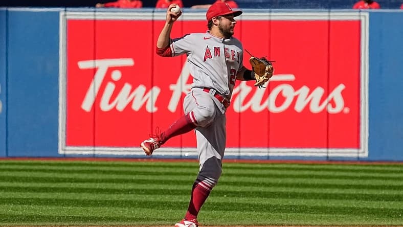Aug 27, 2022; Toronto, Ontario, CAN; Los Angeles Angels second baseman David Fletcher (22) goes to throw to first base after a force out on Toronto Blue Jays center fielder George Springer (not pictured) during the first inning at Rogers Centre. Mandatory Credit: John E. Sokolowski-USA TODAY Sports