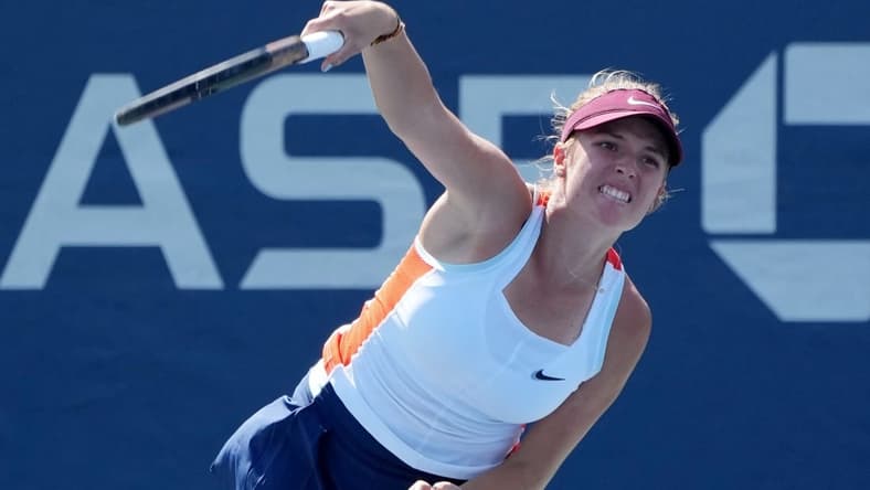 Aug 30, 2022; Flushing, NY, USA; Linda Fruhvirtova of Czech Republic in action against Xinyu Wang of China on day two of the 2022 U.S. Open tennis tournament at USTA Billie Jean King National Tennis Center. Mandatory Credit: Jerry Lai-USA TODAY Sports
