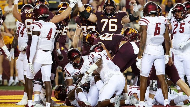Sep 1, 2022; Minneapolis, Minnesota, USA; Minnesota Golden Gophers players celebrate a touchdown New Mexico State Aggies during the first quarter at Huntington Bank Stadium. Mandatory Credit: Matt Krohn-USA TODAY Sports