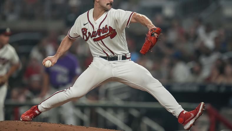 Sep 1, 2022; Cumberland, Georgia, USA; Atlanta Braves starting pitcher Spencer Strider (65) pitches against the Colorado Rockies during the fifth inning at Truist Park. Mandatory Credit: Dale Zanine-USA TODAY Sports
