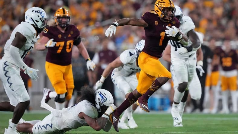 Sep 1, 2022; Tempe, Arizona, USA; Arizona State Sun Devils running back Xazavian Valladay (1) runs with the ball against the Northern Arizona Lumberjacks during the first half at Sun Devil Stadium. Mandatory Credit: Joe Camporeale-USA TODAY Sports