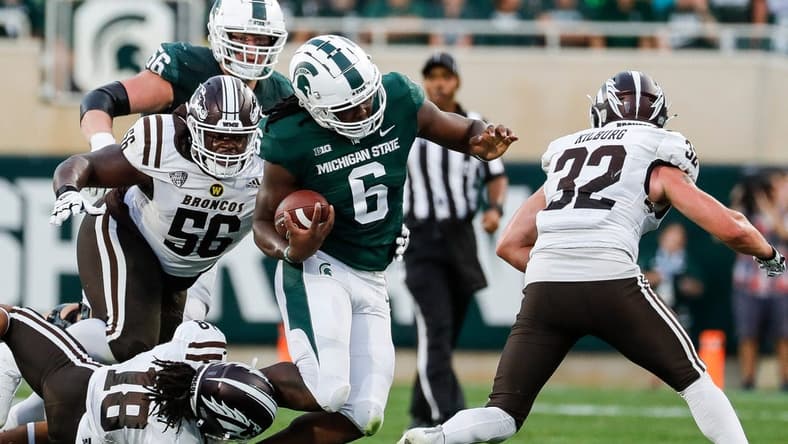 Michigan State tight end Maliq Carr (6) runs against Western Michigan cornerback Keni-H Lovely (18) during the first half at Spartan Stadium in East Lansing on Friday, Sept. 2, 2022.