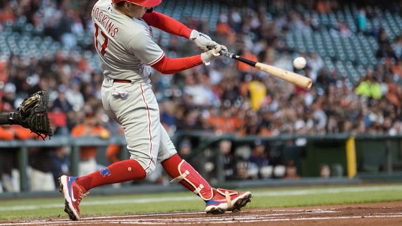 Sep 2, 2022; San Francisco, California, USA; Philadelphia Phillies first baseman Rhys Hoskins (17) hits a single against the San Francisco Giants during the first inning at Oracle Park. Mandatory Credit: John Hefti-USA TODAY Sports