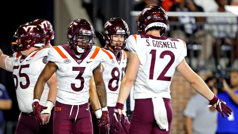 Sep 2, 2022; Norfolk, Virginia, USA;  Virginia Tech Hokies wide receiver Da'Wain Lofton (3) celebrate with defensive back Cam Johnson (12) after scoring a touchdown during the third quarter at Kornblau Field at S.B. Ballard Stadium. Mandatory Credit: Peter Casey-USA TODAY Sports