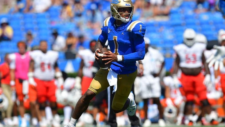 Sep 3, 2022; Pasadena, California, USA; UCLA Bruins quarterback Dorian Thompson-Robinson (1) moves out to pass against the Bowling Green Falcons during the second half at Rose Bowl. Mandatory Credit: Gary A. Vasquez-USA TODAY Sports