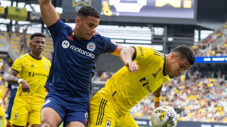 Sep 3, 2022; Columbus, Ohio, USA; Columbus Crew forward Cucho (9) dribbles the ball while Chicago Fire defender Miguel Angel Navarro (6) defends in the first half at Lower.com Field. Mandatory Credit: Trevor Ruszkowski-USA TODAY Sports