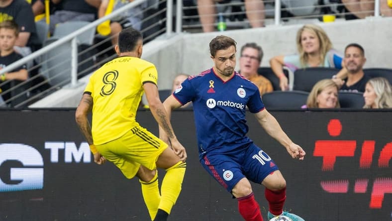 Sep 3, 2022; Columbus, Ohio, USA; Chicago Fire midfielder Xherdan Shaqiri (10) dribbles the ball while Columbus Crew midfielder Artur (8) defends in the second half at Lower.com Field. Mandatory Credit: Trevor Ruszkowski-USA TODAY Sports