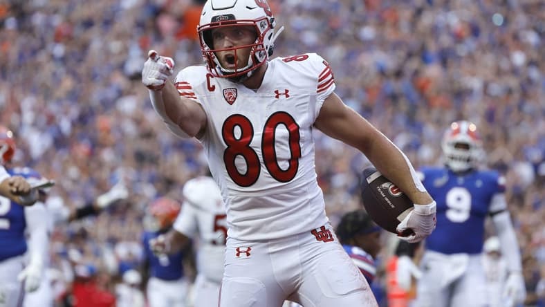 Sep 3, 2022; Gainesville, Florida, USA; Utah Utes tight end Brant Kuithe (80) celebrates after he scores a touchdown against the Florida Gators during the first quarter at Steve Spurrier-Florida Field. Mandatory Credit: Kim Klement-USA TODAY Sports