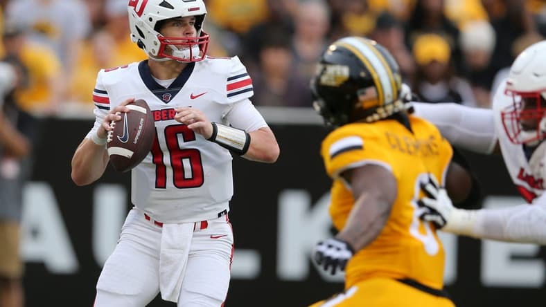 Sep 3, 2022; Hattiesburg, Mississippi, USA; Liberty Flames quarterback Charlie Brewer (16) looks to throw against the Southern Miss Golden Eagles in the first quarter at M.M. Roberts Stadium. Mandatory Credit: Chuck Cook-USA TODAY Sports