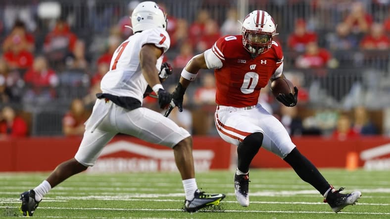 Sep 3, 2022; Madison, Wisconsin, USA;  Wisconsin Badgers running back Braelon Allen (0) rushes with the football during the second quarter against the Illinois State Redbirds at Camp Randall Stadium. Mandatory Credit: Jeff Hanisch-USA TODAY Sports