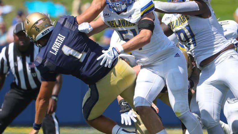Delaware's Drew Nickles (51) and Artis Hemmingway (right) pressure Navy quarterback Tai Lavatai in the third quarter of the Blue Hens' 14-7 win at Navy-Marine Corps Memorial Stadium in Annapolis, Md., Saturday, Sept. 3, 2022.

Ncaa Football Wil Hens Navy Gamer Delaware At Navy