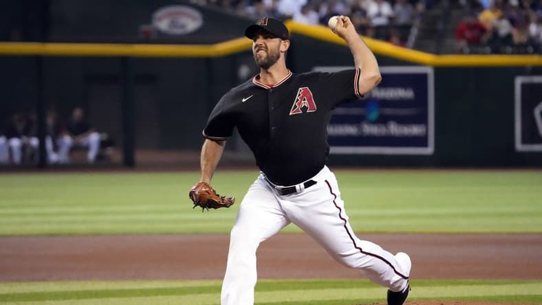 Sep 3, 2022; Phoenix, Arizona, USA; Arizona Diamondbacks starting pitcher Madison Bumgarner (40) throws against the Milwaukee Brewers during the first inning at Chase Field. Mandatory Credit: Joe Camporeale-USA TODAY Sports