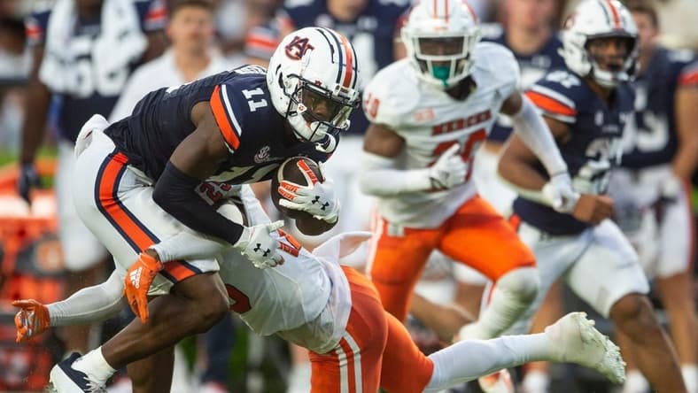 Auburn Tigers wide receiver Shedrick Jackson (11) turns up field after catching a pass as Auburn Tigers take on Mercer Bears at Jordan-Hare Stadium in Auburn, Ala., on Saturday, Sept. 3, 2022. Auburn Tigers leads Mercer Bears 28-7 at halftime.