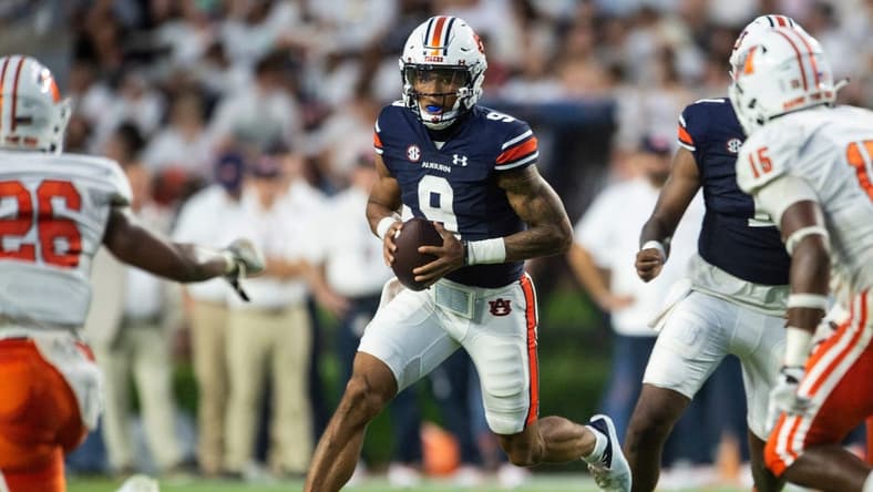 Auburn Tigers quarterback Robby Ashford (9) runs an option play as Auburn Tigers take on Mercer Bears at Jordan-Hare Stadium in Auburn, Ala., on Saturday, Sept. 3, 2022. Auburn Tigers leads Mercer Bears 28-7 at halftime.