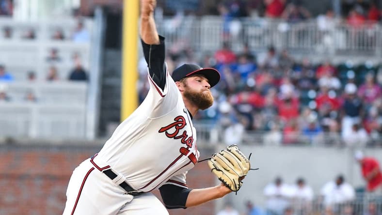 Sep 3, 2022; Cumberland, Georgia, USA; Atlanta Braves starting pitcher Bryce Elder (55) throws against the Miami Marlins in the first inning at Truist Park. Mandatory Credit: Larry Robinson-USA TODAY Sports