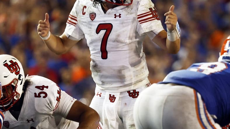 Sep 3, 2022; Gainesville, Florida, USA; Utah Utes quarterback Cameron Rising (7) calls a play against the Florida Gators during the second half at Steve Spurrier-Florida Field. Mandatory Credit: Kim Klement-USA TODAY Sports