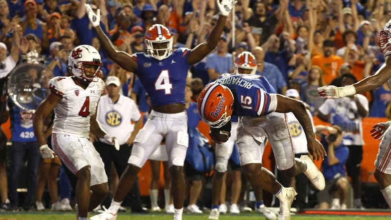 Sep 3, 2022; Gainesville, Florida, USA; Florida Gators quarterback Anthony Richardson (15) scores a touchdown against the Utah Utes during the second half at Steve Spurrier-Florida Field. Mandatory Credit: Kim Klement-USA TODAY Sports
