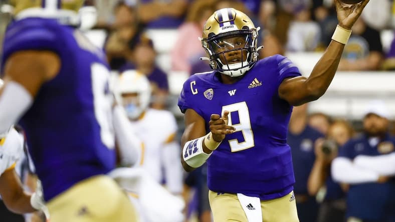 Sep 3, 2022; Seattle, Washington, USA; Washington Huskies quarterback Michael Penix Jr. (9) passes against the Kent State Golden Flashes during the first quarter at Alaska Airlines Field at Husky Stadium. Mandatory Credit: Joe Nicholson-USA TODAY Sports
