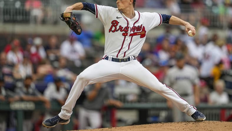 Sep 4, 2022; Cumberland, Georgia, USA; Atlanta Braves starting pitcher Max Fried (54) pitches against the Miami Marlins during the second inning at Truist Park. Mandatory Credit: Dale Zanine-USA TODAY Sports