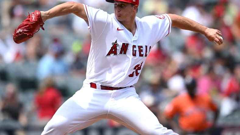 Sep 4, 2022; Anaheim, California, USA; Los Angeles Angels starting pitcher Tucker Davidson (32) throws a pitch against the Houston Astros during the first inning at Angel Stadium. Mandatory Credit: Orlando Ramirez-USA TODAY Sports