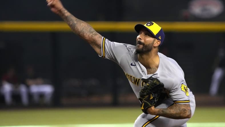 Sep 4, 2022; Phoenix, Arizona, USA; Milwaukee Brewers relief pitcher Matt Bush (50) throws against the Arizona Diamondbacks in the eighth inning at Chase Field. Mandatory Credit: Rick Scuteri-USA TODAY Sports