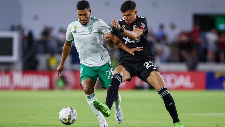 Sep 4, 2022; Washington, District of Columbia, USA; Colorado Rapids midfielder Bryan Acosta (21) and D.C. United forward Miguel Berry (22) battle for the ball during the first half at Audi Field. Mandatory Credit: Scott Taetsch-USA TODAY Sports