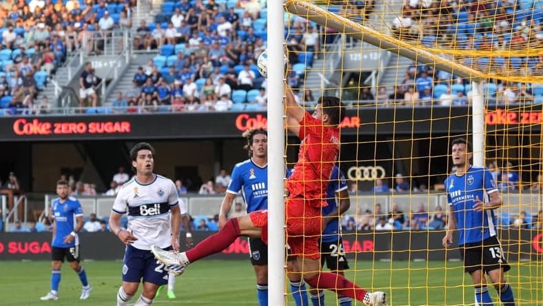 Sep 4, 2022; San Jose, California, USA; San Jose Earthquakes goalkeeper JT Marcinkowski (1) makes a save against the Vancouver Whitecaps during the first half at PayPal Park. Mandatory Credit: Darren Yamashita-USA TODAY Sports